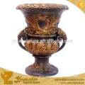 brass flower pot with animal sculpture